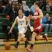 Dexter's Makenzie Svihra drives the ball down court against Canton's Paige Aresco during the first half the regional semifinal game at Novi High School Tuesday, Mar. 5th.
Courtney Sacco I AnnArbor.com  
